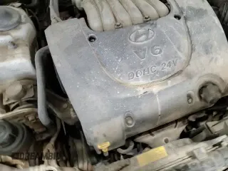 2002 Hyundai Sonata GLS z VIN KMHWF35H12A607526, wystawiony jako Copart lot #83826114 z przebiegiem 149 277 mil mil oraz Czysty tytuł • Clean title. Historia ofert i sprzedaży dostępna na DreamBid. Obrazek 13.