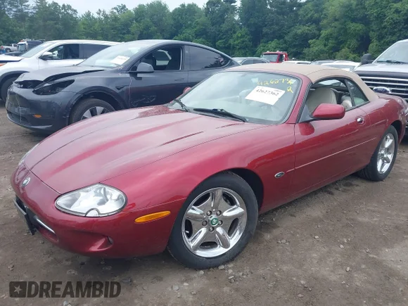 ✅ 1998 Jaguar XK • VIN: SAJGX2241WC018831 • Lot: 42627362. Wystawiony na IAAI z przebiegiem 71 263 mil. Bezpłatny archiwum sprzedaży aukcyjnych z USA i szczegółowy raport historii pojazdu na DreamBid. Zdjęcie 2.