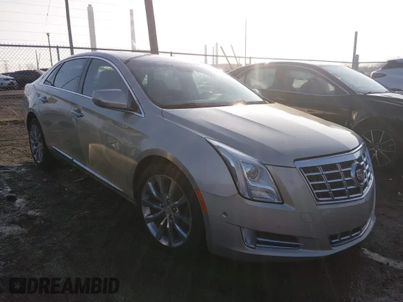 ✅ 2015 Cadillac XTS Premium • VIN: 2G61P5S32F9261202 • Лот: 44009689. Опубліковано раніше на IAAI з пробігом 144 759 миль. Безкоштовний доступ до архіву аукціонних продажів зі США та докладний звіт про історію автомобіля на DreamBid. Зображення 1.