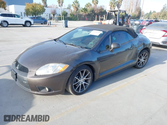 ✅ 2012 Mitsubishi Eclipse GS Sport • VIN: 4A37L2EF8CE003540 • Lot: 43900349. Listed on IAAI with 143,963 mi. Free auction sales archive from the USA and detailed vehicle history report at DreamBid. Image 2.