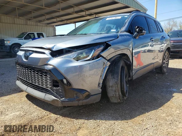 ✅ 2023 Toyota Corolla Cross Hybrid SE • VIN: 7MUFBABG7PV006279 • Лот: 46288156. Опубликован ранее на Copart с пробегом 62 622 миль. Бесплатный доступ к архиву аукционных продаж из США и подробный отчёт об истории автомобиля на DreamBid. Изображение 1.