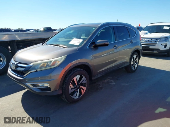 ✅ 2016 Honda CR-V Touring • VIN: 5J6RM3H97GL000595 • Lot: 43578846. Wystawiony na IAAI z przebiegiem 129 920 mil. Bezpłatny archiwum sprzedaży aukcyjnych z USA i szczegółowy raport historii pojazdu na DreamBid. Zdjęcie 2.