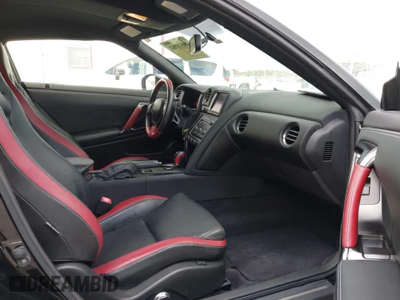 ✅ 2014 Nissan GT-R Premium • VIN: JN1AR5EFXEM270814 • Лот: 43014763. Опубліковано раніше на IAAI з пробігом 33 923 миль. Безкоштовний доступ до архіву аукціонних продажів зі США та докладний звіт про історію автомобіля на DreamBid. Зображення 5.