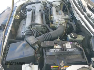 ✅ 1997 Mazda Protege DX • VIN: JM1BC1415V0101406 • Lot: 40932010. Wystawiony na IAAI z przebiegiem 164 899 mil. Bezpłatny archiwum sprzedaży aukcyjnych z USA i szczegółowy raport historii pojazdu na DreamBid. Zdjęcie 12.