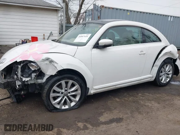 ✅ 2013 Volkswagen Beetle 2.0L TDI • VIN: 3VWJL7AT5DM675453 • Lot: 44507431. Wystawiony na IAAI z przebiegiem 125 140 mil. Bezpłatny archiwum sprzedaży aukcyjnych z USA i szczegółowy raport historii pojazdu na DreamBid. Zdjęcie 6.