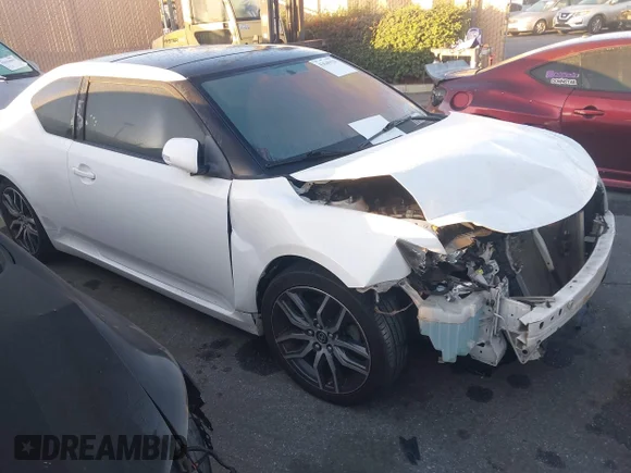 ✅ 2012 Scion tC • VIN: JTKJF5C79C3025175 • Lot: 43640120. Listed on IAAI with 84,541 mi. Free auction sales archive from the USA and detailed vehicle history report at DreamBid. Image 1.