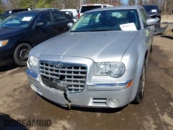 ✅ 2008 Chrysler 300 Limited • VIN: 2C3KA33G28H118613 • Lot: 41786671. Wystawiony na IAAI z przebiegiem 143 214 mil. Bezpłatny archiwum sprzedaży aukcyjnych z USA i szczegółowy raport historii pojazdu na DreamBid. Zdjęcie 6.