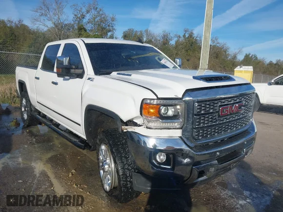 ✅ 2017 GMC Sierra 2500HD SLT • VIN: 1GT12TEY7HF198745 • Lot: 43801924. Wystawiony na IAAI z przebiegiem 143 224 mil. Bezpłatny archiwum sprzedaży aukcyjnych z USA i szczegółowy raport historii pojazdu na DreamBid. Zdjęcie 1.
