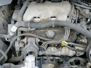 ✅ 2004 Pontiac Montana • VIN: 1GMDU03E64D160424 • Лот: 81909314. Опубликован ранее на Copart с пробегом 148 663 миль. Бесплатный доступ к архиву аукционных продаж из США и подробный отчёт об истории автомобиля на DreamBid. Изображение 14.