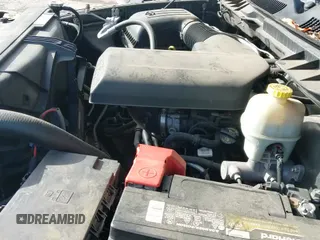 ✅ 2015 Ram 1500 SLT • VIN: 1C6RR6GG4FS529751 • Lot: 43349323. Listed on IAAI with 163,123 mi. Free auction sales archive from the USA and detailed vehicle history report at DreamBid. Image 19.