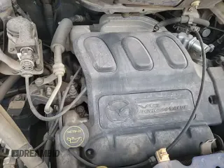 ✅ 2005 Mazda MPV ES • VIN: JM3LW28J650543033 • Lot: 84278304. Wystawiony na Copart z przebiegiem 190 873 mil. Bezpłatny archiwum sprzedaży aukcyjnych z USA i szczegółowy raport historii pojazdu na DreamBid. Zdjęcie 16.