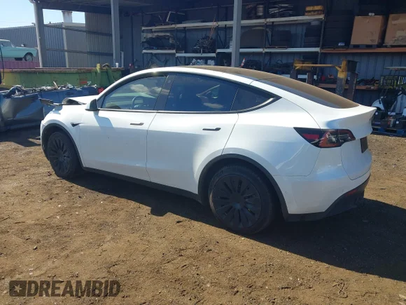 ✅ 2022 Tesla Model Y Long Range • VIN: 7SAYGAEE8NF540779 • Лот: 44025809. Опубликован ранее на IAAI с пробегом 50 662 миль. Бесплатный доступ к архиву аукционных продаж из США и подробный отчёт об истории автомобиля на DreamBid. Изображение 3.