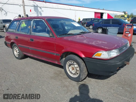 ✅ 1990 Toyota Corolla • VIN: JT2AE94K7L3348492 • Lot: 44789688. Listed on IAAI with 239,016 mi. Free auction sales archive from the USA and detailed vehicle history report at DreamBid. Image 1.