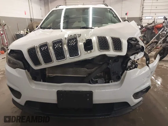 ✅ 2022 Jeep Cherokee Latitude Lux • VIN: 1C4PJMMX1ND520203 • Lot: 43798383. Listed on IAAI with 113,140 mi. Free auction sales archive from the USA and detailed vehicle history report at DreamBid. Image 6.