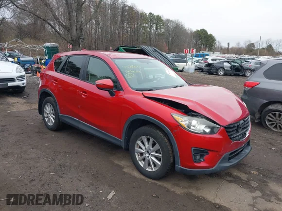✅ 2016 Mazda CX-5 Touring • VIN: JM3KE2CY6G0619260 • Lot: 44735610. Wystawiony na IAAI z przebiegiem 73 514 mil. Bezpłatny archiwum sprzedaży aukcyjnych z USA i szczegółowy raport historii pojazdu na DreamBid. Zdjęcie 1.