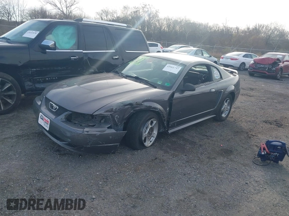 ✅ 2003 Ford Mustang Standard • VIN: 1FAFP40423F323327 • Lot: 43661737. Wystawiony na IAAI z przebiegiem 101 195 mil. Bezpłatny archiwum sprzedaży aukcyjnych z USA i szczegółowy raport historii pojazdu na DreamBid. Zdjęcie 2.