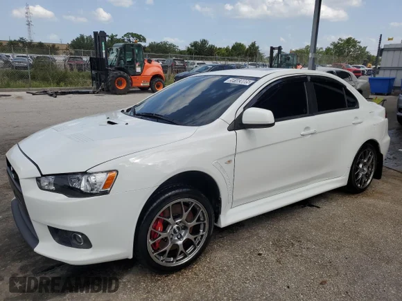 ✅ 2014 Mitsubishi Lancer Evolution MR • VIN: JA32W5FV3EU011211 • Лот: 59183005. Опубліковано раніше на Copart з пробігом 98 483 миль. Безкоштовний доступ до архіву аукціонних продажів зі США та докладний звіт про історію автомобіля на DreamBid. Зображення 1.