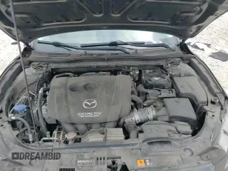 ✅ 2018 Mazda 3 Grand Touring • VIN: 3MZBN1M31JM269916 • Лот: 71039625. Опубликован ранее на Copart с пробегом 69 967 миль. Бесплатный доступ к архиву аукционных продаж из США и подробный отчёт об истории автомобиля на DreamBid. Изображение 15.