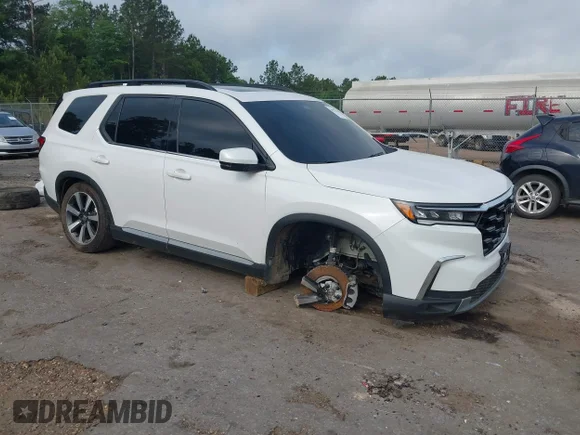 ✅ 2025 Honda Pilot Touring • VIN: 5FNYG1H7XSB017169 • Лот: 44958131. Опубликован ранее на IAAI с пробегом 41 469 миль. Бесплатный доступ к архиву аукционных продаж из США и подробный отчёт об истории автомобиля на DreamBid. Изображение 1.