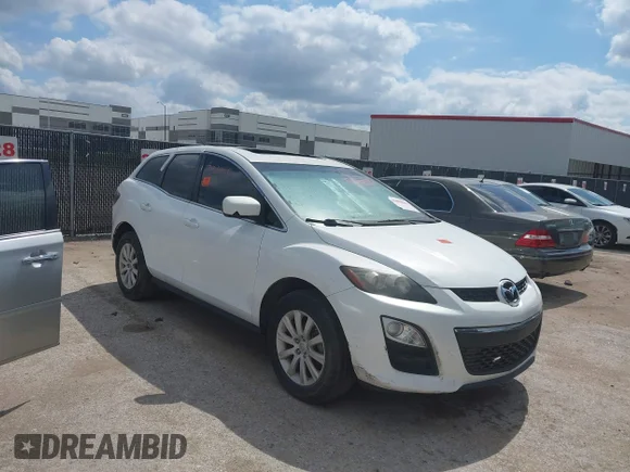 ✅ 2012 Mazda CX-7 i Touring • VIN: JM3ER2C55C0421769 • Lot: 45081411. Wystawiony na IAAI z przebiegiem Nie podano. Bezpłatny archiwum sprzedaży aukcyjnych z USA i szczegółowy raport historii pojazdu na DreamBid. Zdjęcie 1.