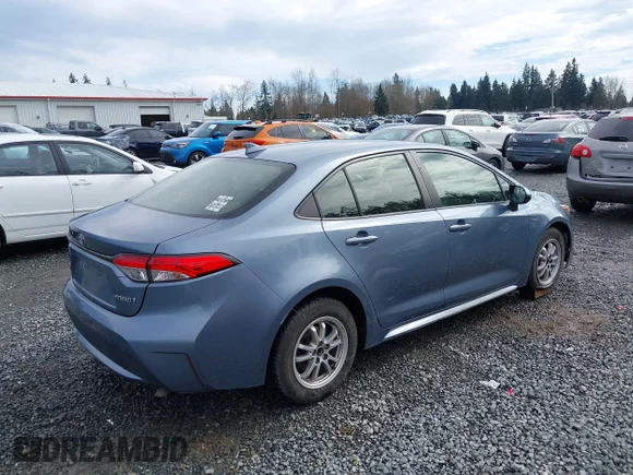 ✅ 2021 Toyota Corolla Hybrid LE • VIN: JTDEAMDE9MJ009165 • Lot: 44603077. Wystawiony na IAAI z przebiegiem 70 747 mil. Bezpłatny archiwum sprzedaży aukcyjnych z USA i szczegółowy raport historii pojazdu na DreamBid. Zdjęcie 4.