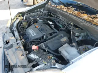 ✅ 2005 Honda CR-V LX • VIN: JHLRD78525C017797 • Lot: 43753803. Listed on IAAI with 238,882 mi. Free auction sales archive from the USA and detailed vehicle history report at DreamBid. Image 12.