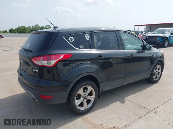 ✅ 2014 Ford Escape SE • VIN: 1FMCU0GX5EUE11149 • Lot: 45456161. Listed on IAAI with 146,151 mi. Free auction sales archive from the USA and detailed vehicle history report at DreamBid. Image 4.