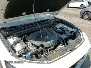 ✅ 2022 Mazda CX-30 Premium Plus • VIN: 3MVDMBEYXNM444201 • Лот: 80749735. Опубликован ранее на Copart с пробегом 57 529 миль. Бесплатный доступ к архиву аукционных продаж из США и подробный отчёт об истории автомобиля на DreamBid. Изображение 14.