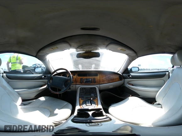 ✅ 2003 Jaguar XK • VIN: SAJDA42B233A34355 • Lot: 43245245. Wystawiony na IAAI z przebiegiem 135 282 mil. Bezpłatny archiwum sprzedaży aukcyjnych z USA i szczegółowy raport historii pojazdu na DreamBid. Zdjęcie 18.