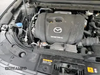 ✅ 2022 Mazda CX-5 S Carbon Edition • VIN: JM3KFBCM6N0634526 • Лот: 87400085. Опубликован ранее на Copart с пробегом 50 212 миль. Бесплатный доступ к архиву аукционных продаж из США и подробный отчёт об истории автомобиля на DreamBid. Изображение 14.