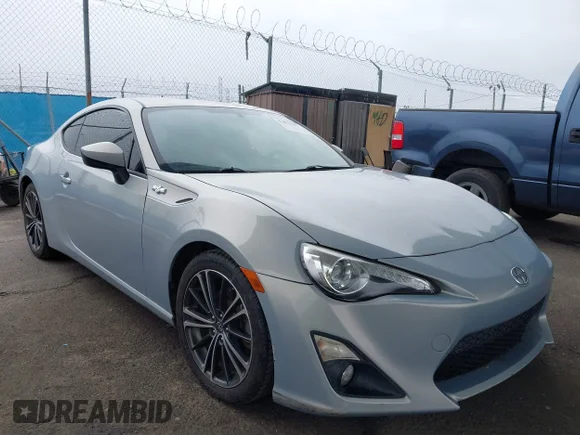 ✅ 2013 Scion FR-S • VIN: JF1ZNAA1XD1729330 • Lot: 41804449. Listed on IAAI with 58,461 mi. Free auction sales archive from the USA and detailed vehicle history report at DreamBid. Image 1.