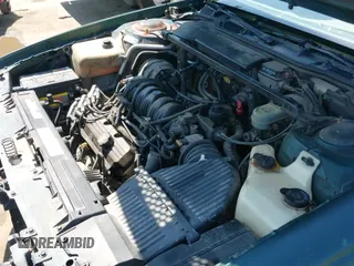 ✅ 1997 Pontiac Bonneville SE • VIN: 1G2HX52K6VH226146 • Lot: 42550933. Wystawiony na IAAI z przebiegiem 311 554 mil. Bezpłatny archiwum sprzedaży aukcyjnych z USA i szczegółowy raport historii pojazdu na DreamBid. Zdjęcie 12.