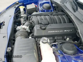 ✅ 2022 Dodge Charger Scat Pack Widebody • VIN: 2C3CDXGJ0NH176255 • Lot: 39576763. Wystawiony na IAAI z przebiegiem 18 324 mil. Bezpłatny archiwum sprzedaży aukcyjnych z USA i szczegółowy raport historii pojazdu na DreamBid. Zdjęcie 19.