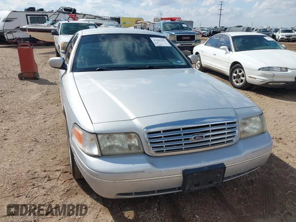 ✅ 2002 Ford Crown Victoria LX • VIN: 2FAFP74W02X121618 • Lot: 43187432. Wystawiony na IAAI z przebiegiem 183 509 mil. Bezpłatny archiwum sprzedaży aukcyjnych z USA i szczegółowy raport historii pojazdu na DreamBid. Zdjęcie 6.