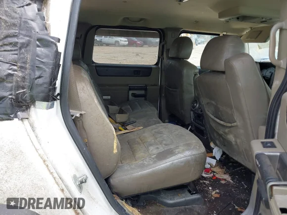 ✅ 2003 Hummer H2 • VIN: 5GRGN23UX3H127837 • Лот: 39721105. Опубліковано раніше на IAAI з пробігом 364 643 миль. Безкоштовний доступ до архіву аукціонних продажів зі США та докладний звіт про історію автомобіля на DreamBid. Зображення 8.