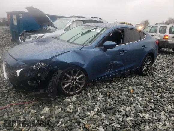 ✅ 2018 Mazda 3 Touring • VIN: 3MZBN1V3XJM172972 • Лот: 71174362. Опубликован ранее на Copart с пробегом 58 897 миль. Бесплатный доступ к архиву аукционных продаж из США и подробный отчёт об истории автомобиля на DreamBid. Изображение 1.