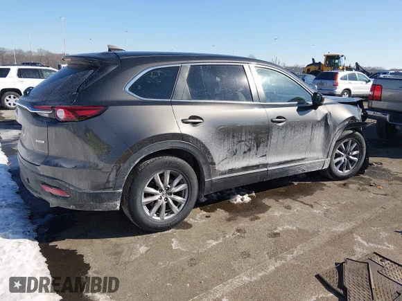 ✅ 2019 Mazda CX-9 Sport • VIN: JM3TCBBY4K0313825 • Lot: 44295309. Listed on IAAI with 81,772 mi. Free auction sales archive from the USA and detailed vehicle history report at DreamBid. Image 4.