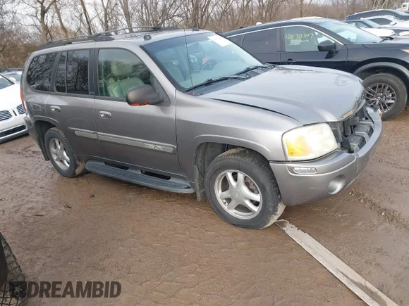 ✅ 2005 GMC Envoy SLT • VIN: 1GKDT13S752276414 • Lot: 41052684. Listed on IAAI with 200,919 mi. Free auction sales archive from the USA and detailed vehicle history report at DreamBid. Image 1.
