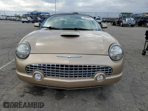 ✅ 2005 Ford Thunderbird Deluxe • VIN: 1FAHP60A35Y107942 • Lot: 79070254. Wystawiony na Copart z przebiegiem 95 582 mil. Bezpłatny archiwum sprzedaży aukcyjnych z USA i szczegółowy raport historii pojazdu na DreamBid. Zdjęcie 5.