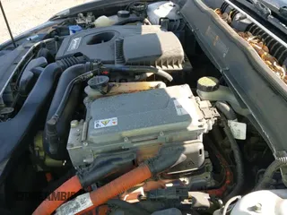 ✅ 2014 Ford Fusion Titanium Hybrid • VIN: 3FA6P0RU3ER279212 • Lot: 42241465. Listed on IAAI with 155,841 mi. Free auction sales archive from the USA and detailed vehicle history report at DreamBid. Image 12.