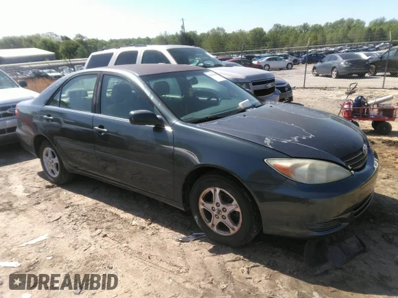 ✅ 2002 Toyota Camry XLE • VIN: 4T1BE32K82U537037 • Lot: 42000056. Listed on IAAI with 265,121 mi. Free auction sales archive from the USA and detailed vehicle history report at DreamBid. Image 1.