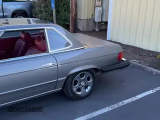 ✅ 1979 Mercedes-Benz SL • VIN: 10704412057346 • Лот: 82082225. Опубликован ранее на Copart с пробегом 121 723 миль. Бесплатный доступ к архиву аукционных продаж из США и подробный отчёт об истории автомобиля на DreamBid. Изображение 11.