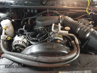 1997 Chevrolet Blazer LS z VIN 1GNDT13W8V2213716, wystawiony jako Copart lot #82782044 z przebiegiem 158 565 mil mil oraz Szkoda całkowita • Salvage title. Historia ofert i sprzedaży dostępna na DreamBid. Obrazek 13.