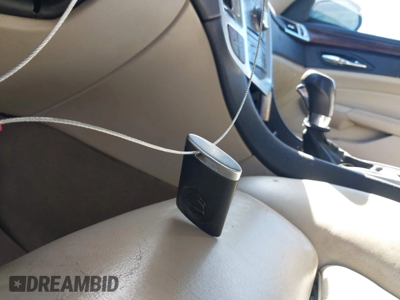 ✅ 2010 Cadillac SRX Turbo Premium Collection • VIN: 3GYFNKE47AS565059 • Lot: 44085821. Wystawiony na IAAI z przebiegiem 134 810 mil. Bezpłatny archiwum sprzedaży aukcyjnych z USA i szczegółowy raport historii pojazdu na DreamBid. Zdjęcie 11.