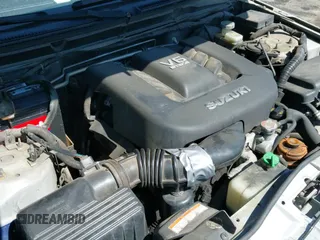 ✅ 2006 Suzuki Grand Vitara Premium • VIN: JS3TE943464100645 • Lot: 41876575. Wystawiony na IAAI z przebiegiem 240 323 mil. Bezpłatny archiwum sprzedaży aukcyjnych z USA i szczegółowy raport historii pojazdu na DreamBid. Zdjęcie 12.