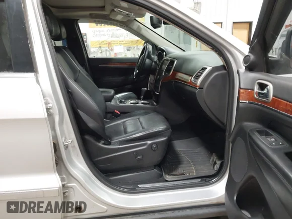 ✅ 2012 Jeep Grand Cherokee Limited • VIN: 1C4RJFBG7CC248640 • Lot: 44297574. Listed on IAAI with 164,818 mi. Free auction sales archive from the USA and detailed vehicle history report at DreamBid. Image 5.