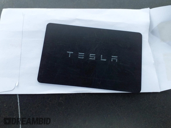 ✅ 2023 Tesla Model Y Long Range • VIN: 7SAYGDEE2PF763324 • Lot: 44975902. Listed on IAAI with 13,466 mi. Free auction sales archive from the USA and detailed vehicle history report at DreamBid. Image 11.