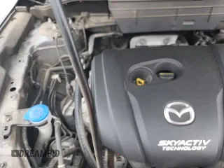 ✅ 2018 Mazda CX-5 Grand Touring • VIN: JM3KFADM7J1466330 • Lot: 82735445. Wystawiony na Copart z przebiegiem 82 891 mil. Bezpłatny archiwum sprzedaży aukcyjnych z USA i szczegółowy raport historii pojazdu na DreamBid. Zdjęcie 15.