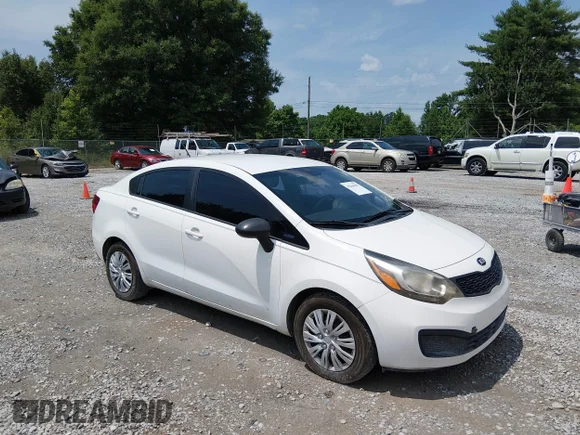 ✅ 2013 Kia Rio LX • VIN: KNADM4A33D6147953 • Лот: 45266293. Опубліковано раніше на IAAI з пробігом 215 861 миль. Безкоштовний доступ до архіву аукціонних продажів зі США та докладний звіт про історію автомобіля на DreamBid. Зображення 1.