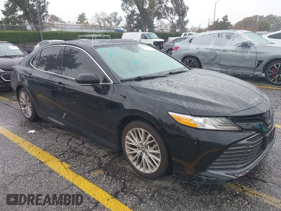 ✅ 2019 Toyota Camry LE • VIN: 4T1B11HK7KU713602 • Лот: 44003119. Опубликован ранее на IAAI с пробегом 192 478 миль. Бесплатный доступ к архиву аукционных продаж из США и подробный отчёт об истории автомобиля на DreamBid. Изображение 1.